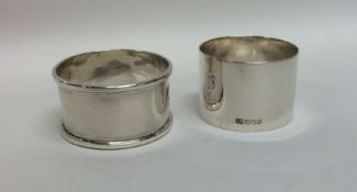 Two heavy silver napkin rings of plain design. App