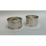 Two heavy silver napkin rings of plain design. App