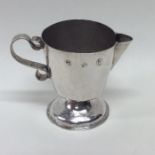 A rare George I miniature silver jug of plain form