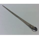 An 18th Century silver meat skewer with crested te