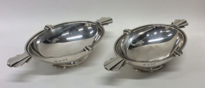 A pair of stylish silver bonbon dishes of shaped f