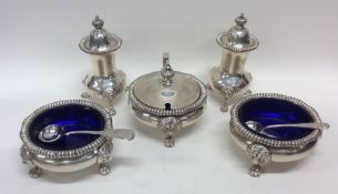 A good quality heavy silver cruet set. London. By