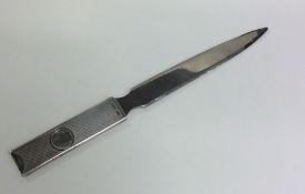 An unusual silver handled cigar cutter / letter op