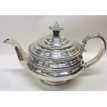 A good heavy circular Georgian silver teapot with