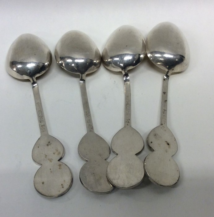 A heavy set of four Chinese silver teaspoons with - Image 2 of 2