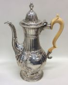 NEWCASTLE: A large Georgian silver coffee pot deco