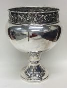 An unusual silver pedestal bowl attractively decor