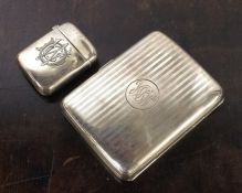 A large silver cheroot case together with a silver