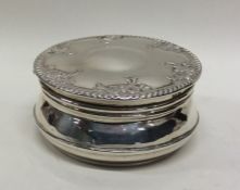 A good Edwardian silver box with floral decorated