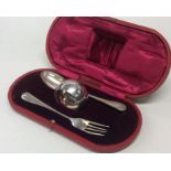 A cased silver three piece christening set. Sheffi