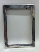 A plain silver picture frame. Birmingham 1924. App