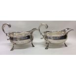 A good pair of Georgian silver sauceboats with cre