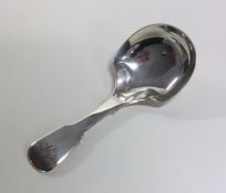 A shaped silver fiddle pattern caddy spoon. Birmin