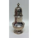 A Georgian silver sugar caster of typical form wit