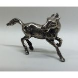 A novelty miniature silver figure of a horse. Appr