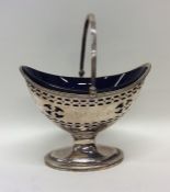 A George III silver sugar basket with bright cut d