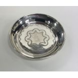 An attractive circular silver pin dish with engrav