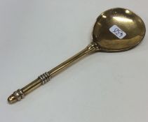 A good silver gilt copy of an early spoon with ree