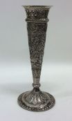 An Indian silver tapering vase decorated with figu