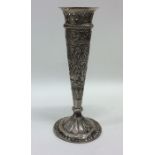 An Indian silver tapering vase decorated with figu