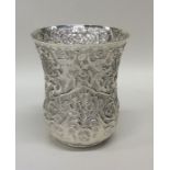 A Turkish silver beaker profusely decorated with f