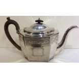 A good Georgian silver teapot with cut corners and