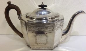 A good Georgian silver teapot with cut corners and