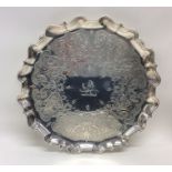 A good George II silver salver crisply decorated w