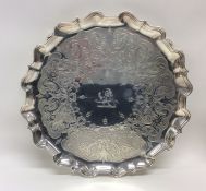 A good George II silver salver crisply decorated w