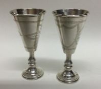 CHESTER: A pair of etched silver goblets. 1915. By