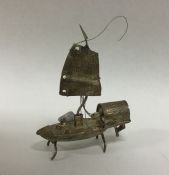 A small novelty model of a junk under sail. Approx