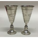 CHESTER: A pair of etched silver goblets. 1915. By