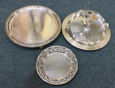 A silver plated Edwardian salver together with a p