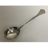 A Russian silver spoon attractively decorated with