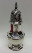 A heavy George II octagonal silver caster with pie