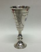 A large tapering etched silver goblet on pedestal