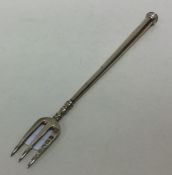 A Victorian silver tapering pickle fork. London 18