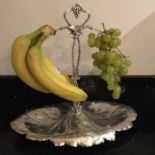 A heavy Continental silver grape / banana stand of