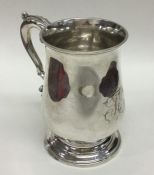 A good George III baluster shaped silver tankard w