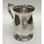 A good George III baluster shaped silver tankard w