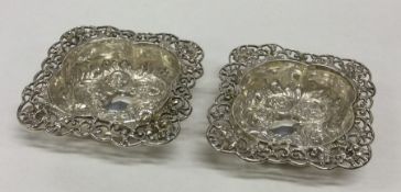 A good pair of cast silver bonbon dishes with chas