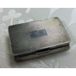 A hinged top engine turned silver snuff box. Birmi