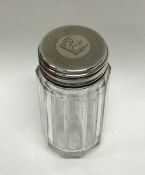 A Victorian silver and glass mounted scent bottle.