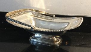 A heavy rectangular Georgian silver swing handled