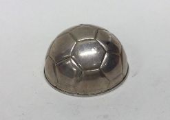 An unusual silver paperweight in the form of a foo