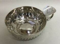 A heavy 19th Century French silver wine taster wit