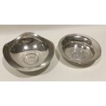 Two Edwardian silver pin dishes with central armor