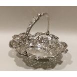 An Edwardian silver swing handled basket of shaped