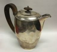 An Edwardian silver hot water jug. Sheffield. By L