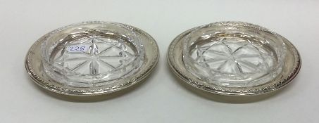 A pair of good quality Edwardian silver butter dis